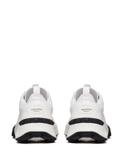Shop Valentino Sneakers Low Top True Act In White