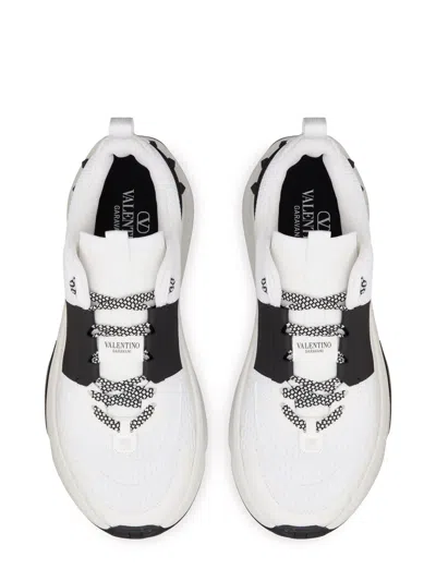 Shop Valentino Sneakers Low Top True Act In White