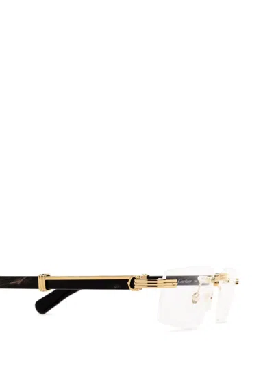 Shop Cartier Eyeglasses In Gold