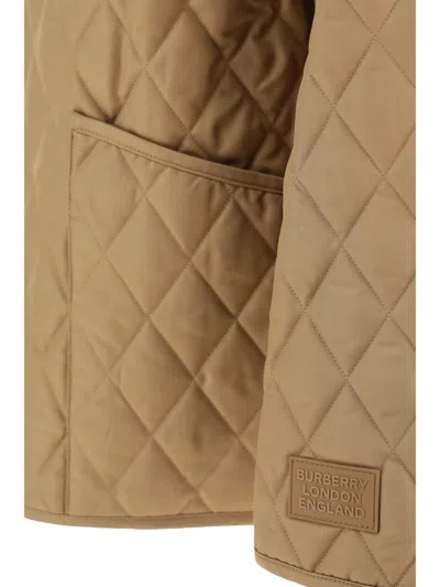 Shop Burberry Down Jackets In Camel