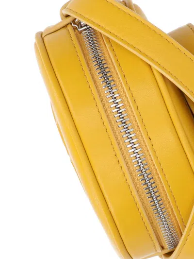 Courrèges Reedition Circle Mini Bag In Yellow