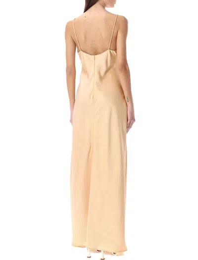 Shop Stella Mccartney Ring Detail Double Satin Maxi Dress In Custard Rose