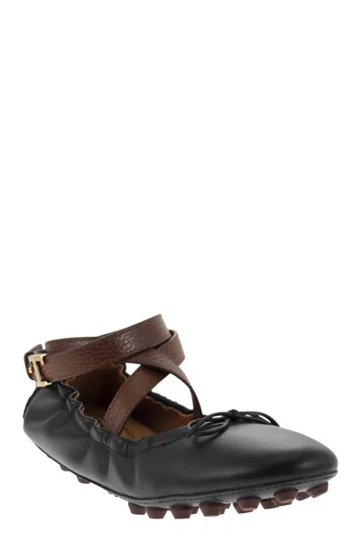 Shop Tod's Bubble Leather Ballerina With Strap In Black