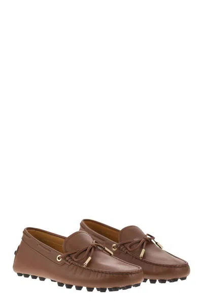 Shop Tod's Bubble Leather Grommet In Cognac