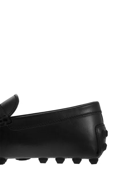 Shop Tod's Bubble T Timeless Leather Grommet In Black