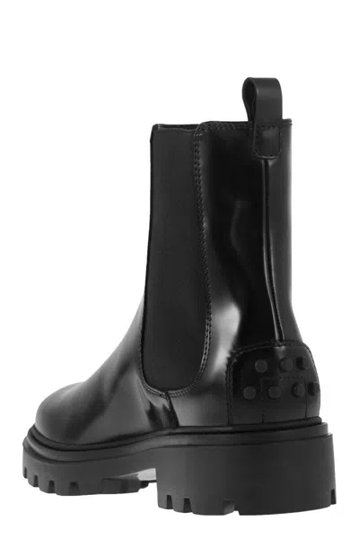 Shop Tod's Leather Chelsea Boot In Black