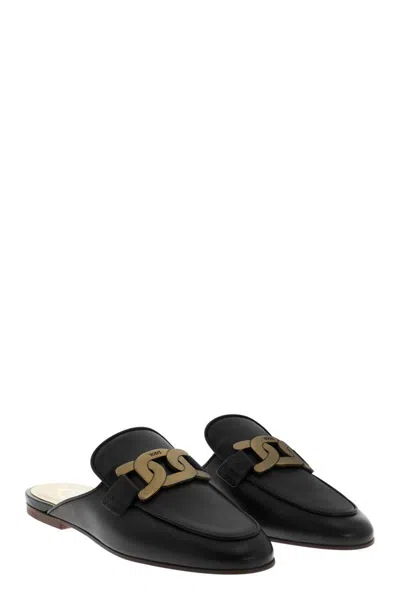 Tod's Glossy Black Slippers With Logo Plaque In Black