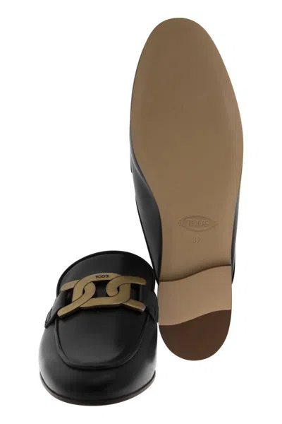 Tod's Glossy Black Slippers With Logo Plaque In Black