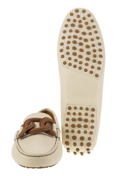 Shop Tod's Moccasin With Leather Chain In White