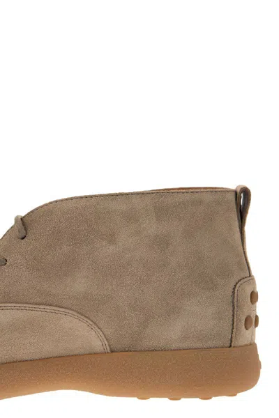 Shop Tod's Suede Leather Boots In Beige