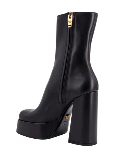 Shop Versace Ankle Boots In Black