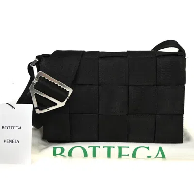 Shop Bottega Veneta Cassette Black Canvas Shoulder Bag ()