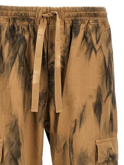 Shop Msgm Dirty-effect Cargo Pants Beige