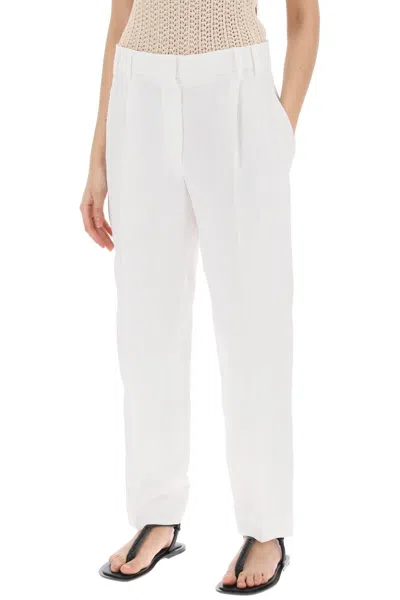 Shop Brunello Cucinelli Tapered Pants With Ple