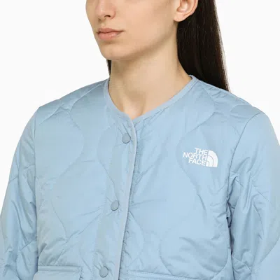 Shop The North Face Light Blue Padded Jacket With Logo