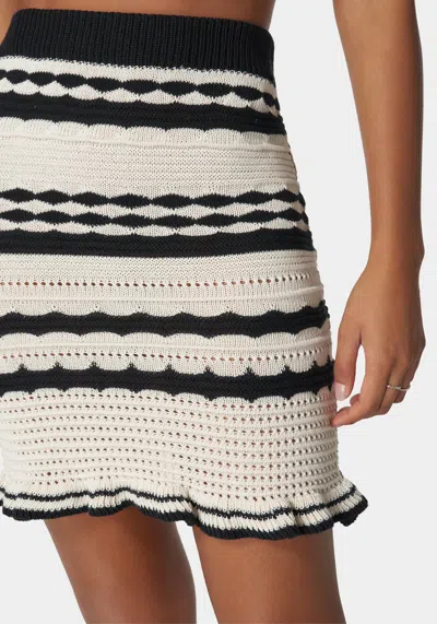 Bebe Trumpet Hem Crochet Mini Sweater Skirt In Black,sand