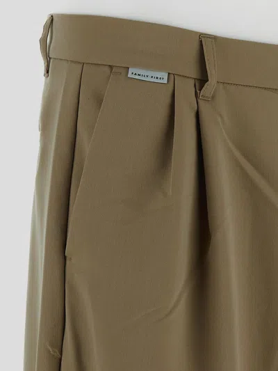 Shop Family First Trousers In Beige
