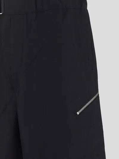 Shop Oamc Trousers In Black