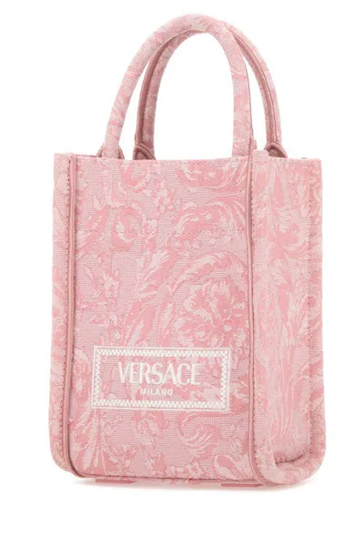 Shop Versace Handbags. In Pink