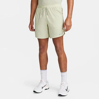 Shop Nike Men's Dri-fit Stride 7-inch Brief-lined Running Shorts In Olive Aura/dark Stucco