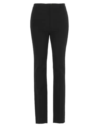Shop Saint Laurent Wool Trousers In Black