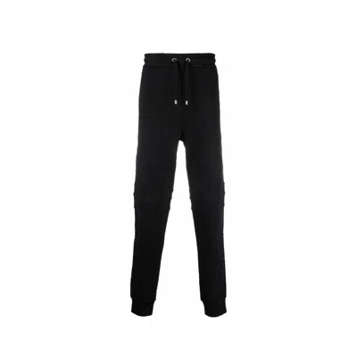 Shop Balmain Cotton Logo Pants In Black