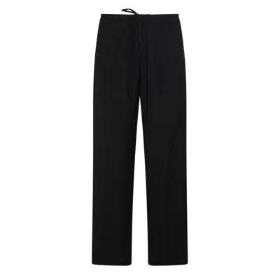Shop The Row Straight Leg Trousers In Black