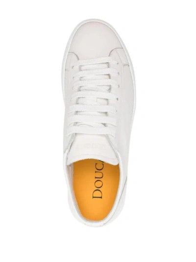 Shop Doucal's Logo-debossed Leather Snekaers In White