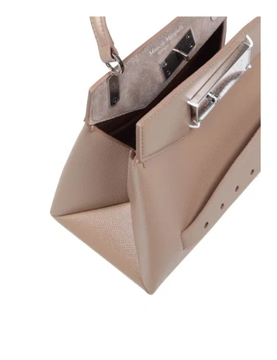 Shop Maison Margiela Small Snatched Handbag In Beige Leather In Pink