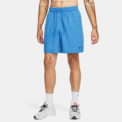 Shop Nike Men's Form Dri-fit Unlined 7" Versatile Shorts In Star Blue/black