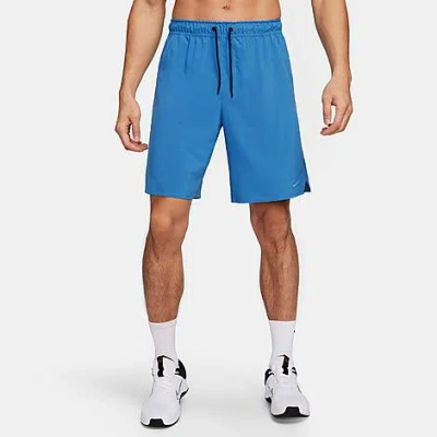Shop Nike Men's Unlimited Dri-fit 9" Unlined Versatile Shorts In Star Blue/black/star Blue