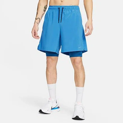 Shop Nike Men's Unlimited Dri-fit 2-in-1 7" Versatile Shorts In Star Blue/court Blue/black/star Blue