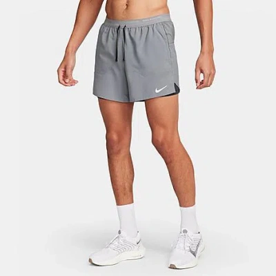 Shop Nike Men's Dri-fit Stride 2-in-1 5" Running Shorts In Smoke Grey/dark Smoke Grey/black