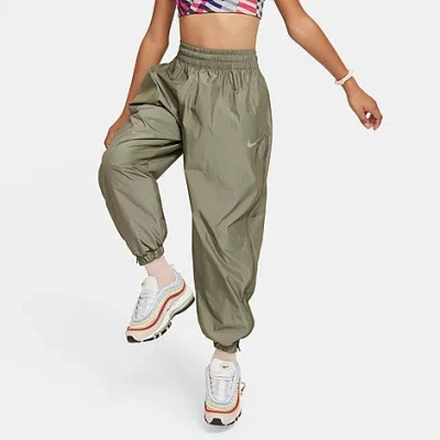 Shop Nike Girls' Sportswear Woven Jogger Pants In Medium Olive/light Bone/light Bone