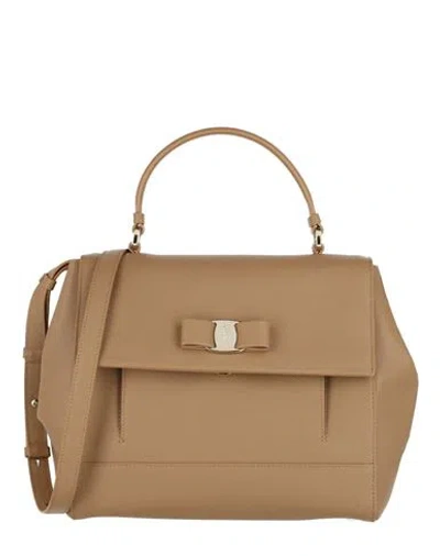 Shop Ferragamo Vara Bow Pebbled Leather Shoulder Bag Woman Handbag Beige Size - Calfskin