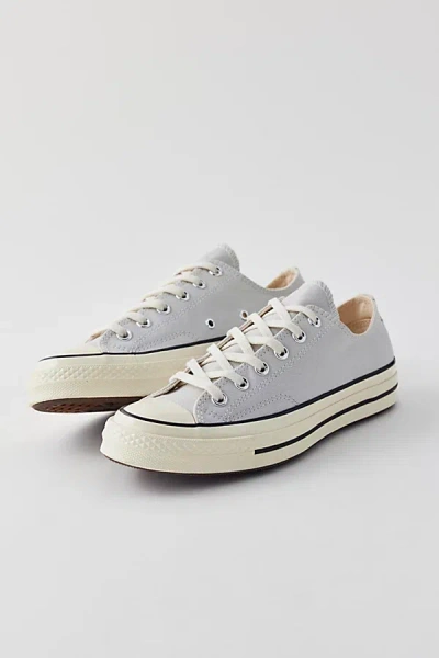 Shop Converse Chuck 70 Low Top Sneaker In Fossilized/egret/black, Women's At Urban Outfitters