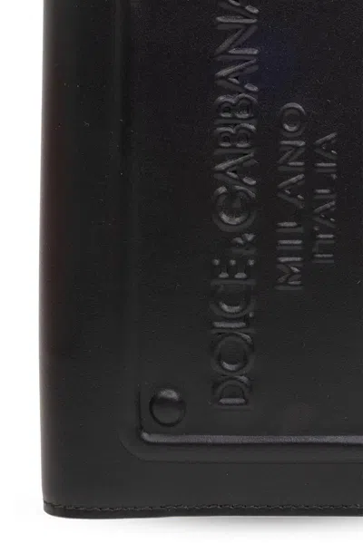 Shop Dolce & Gabbana Logo Embossed Bi-fold Wallet In Black