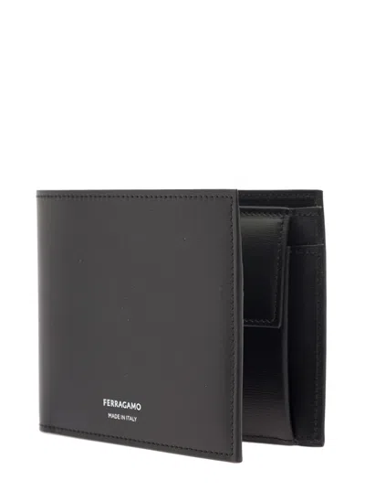 Shop Ferragamo Black Bifold Wallet With Logo Lettering In Leather Man