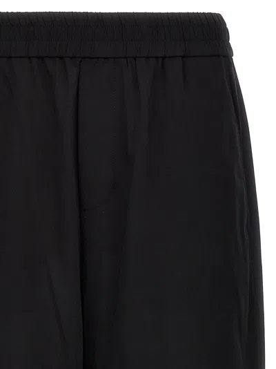 Shop Ami Alexandre Mattiussi Logo Plaque Trousers In Black