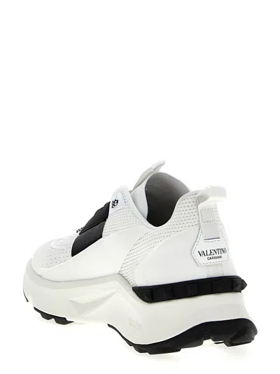 Shop Valentino Garavani True Act Sneakers In White/black