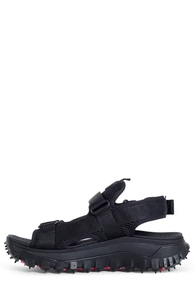 Shop Moncler Trailgrip Vela Slingback Sandals In Black