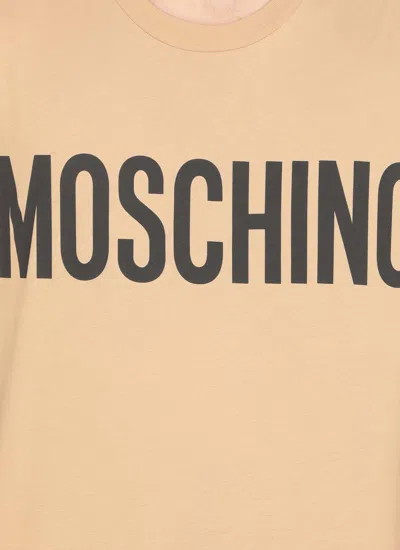Shop Moschino Logo Printed Crewneck T-shirt In Beige