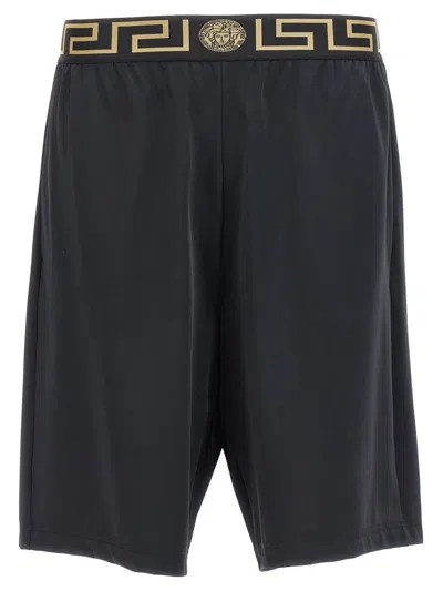 Shop Versace 'greca' Bermuda Shorts In Black