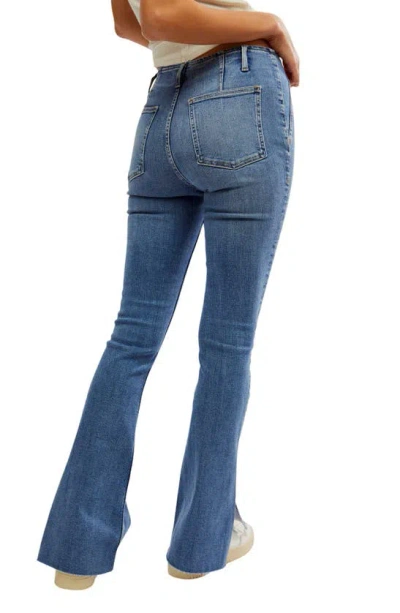 Shop Free People Level Up Side Slit Bootcut Jeans In Sunburst Blue
