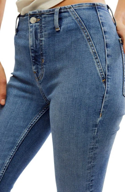 Shop Free People Level Up Side Slit Bootcut Jeans In Sunburst Blue