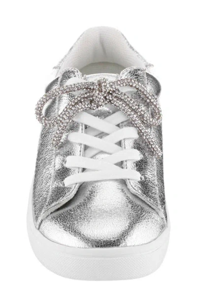 Shop Nina Kids' Metallic Bow Sneaker In Silver Cream