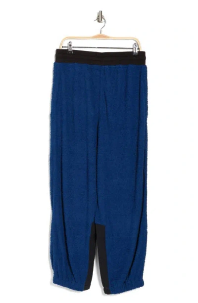 Shop Fp Movement Cuddle Up Fleece Tie Waist Pants In Blue