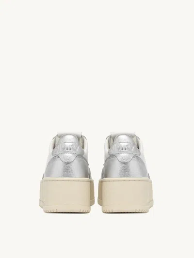Shop Autry International Srl Platform Low Sneakers In White And Silver Leather