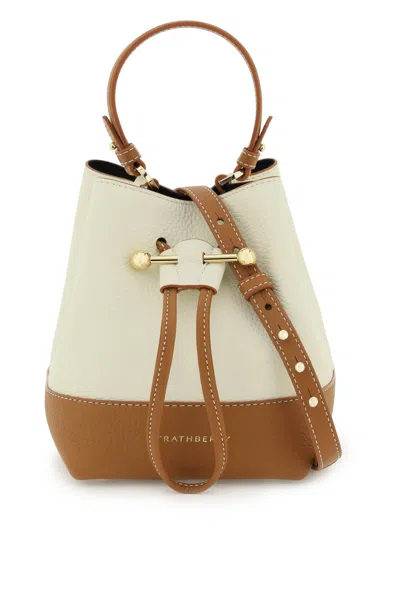 Shop Strathberry Lana Osette Bucket Bag In Vanilla Tan Vanilla Stitch (white)