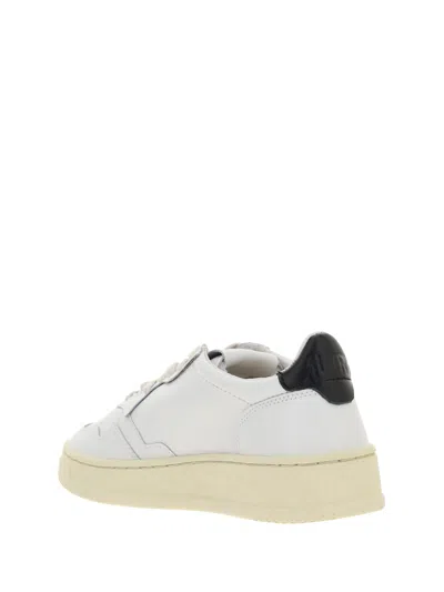 Shop Autry Sneakers In Bianco/nero